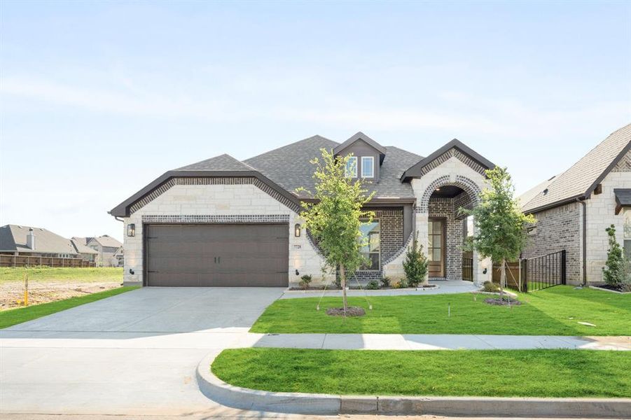 Front exterior of a new home in Silo Mills, Joshua, TX, highlighting curb appeal (Image 1). Front exterior of a new home in Silo Mills, Joshua, TX, highlighting curb appeal (Image 1).