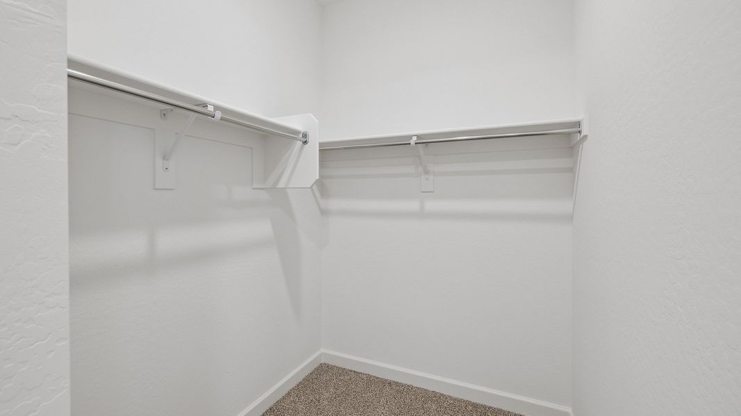 Spacious, unfurnished interior of a new home in Apache Farms, Buckeye (Image 34).