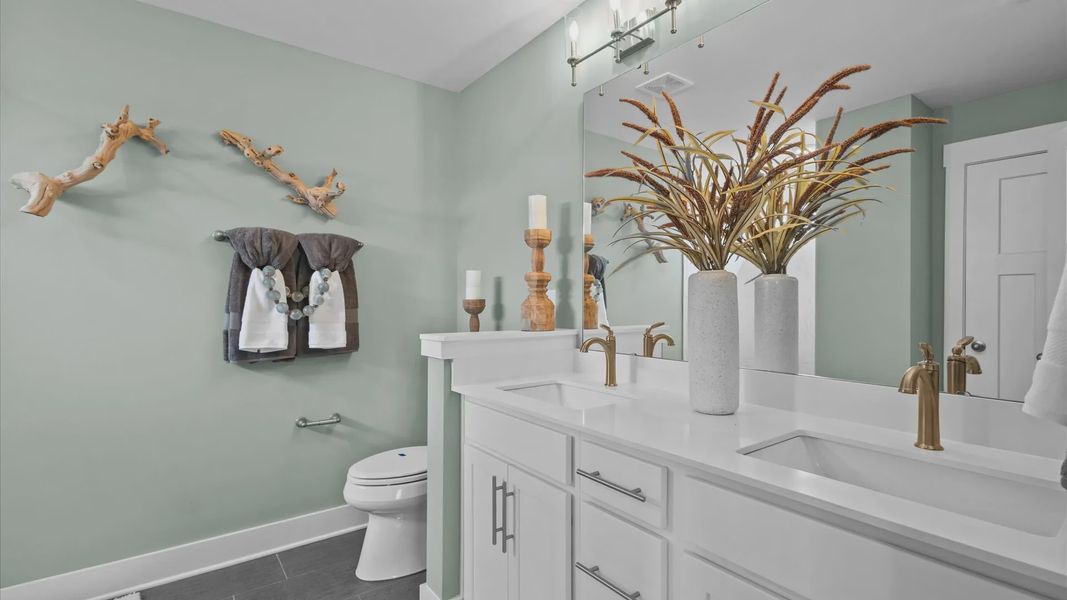 Primary Bathroom of The Cameron Design by DRB Homes
