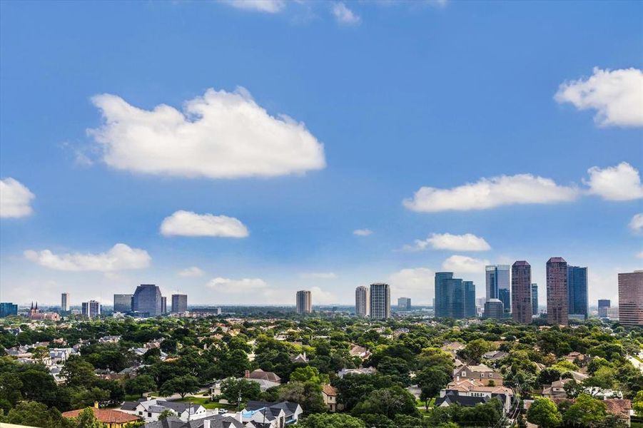 From the balcony at The Hawthorne, a captivating cityscape stretches out before you.