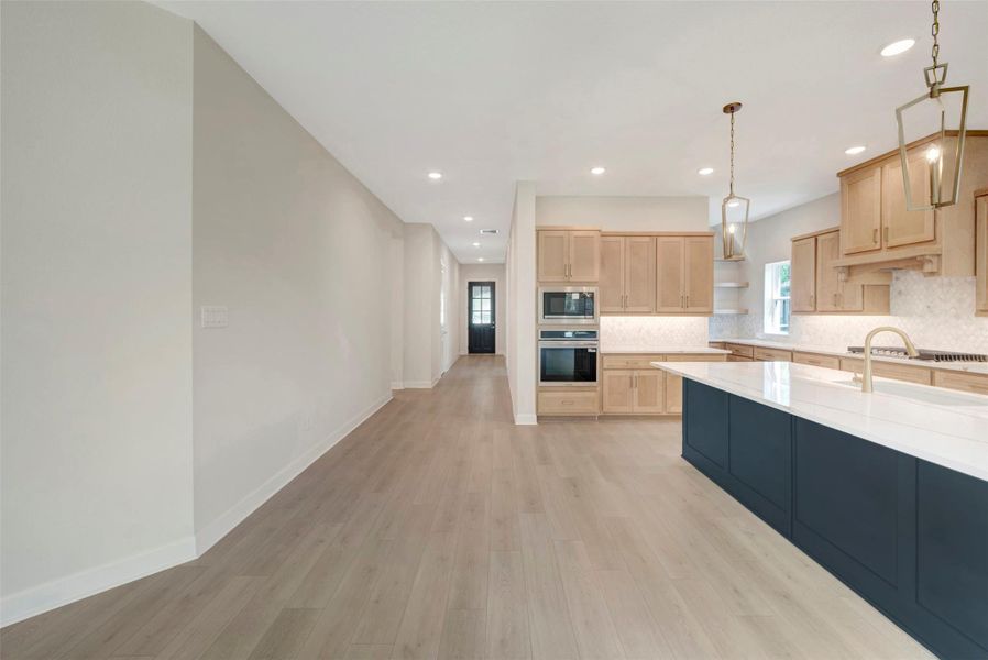 Furnished interior view inside a new home in The Woodlands Hills - Summit Collection, Willis (Image 25).