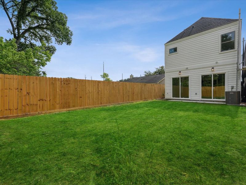 Exterior details and patio area of a home in , Houston (Image 24).