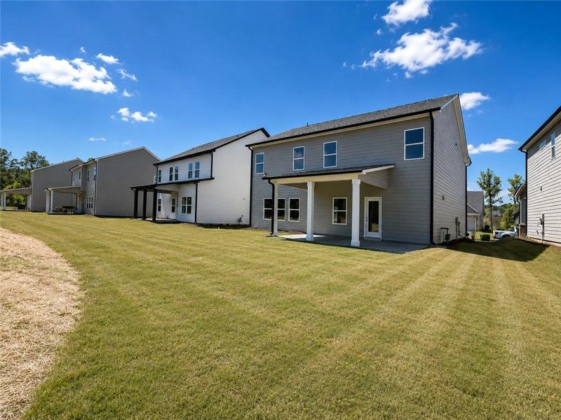 Exterior details and patio area of a home in Ponderosa Farms Estates, Gainesville (Image 3).