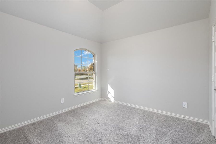 Unfurnished room featuring carpet flooring