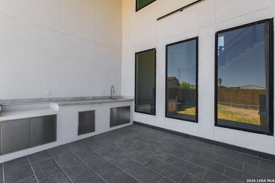 Exterior details and patio area of a home in , Harlingen (Image 33).