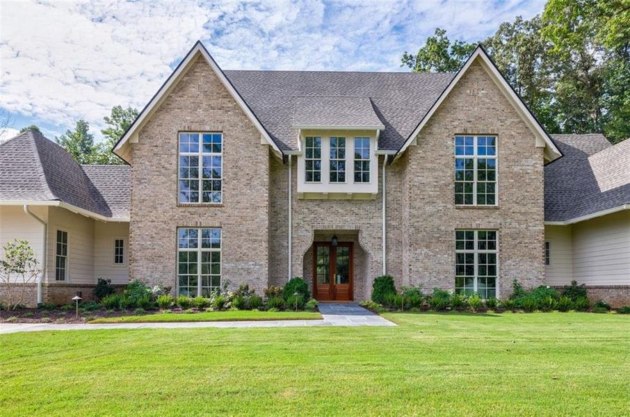 Front exterior of a new home in , Canton, GA, highlighting curb appeal (Image 23).