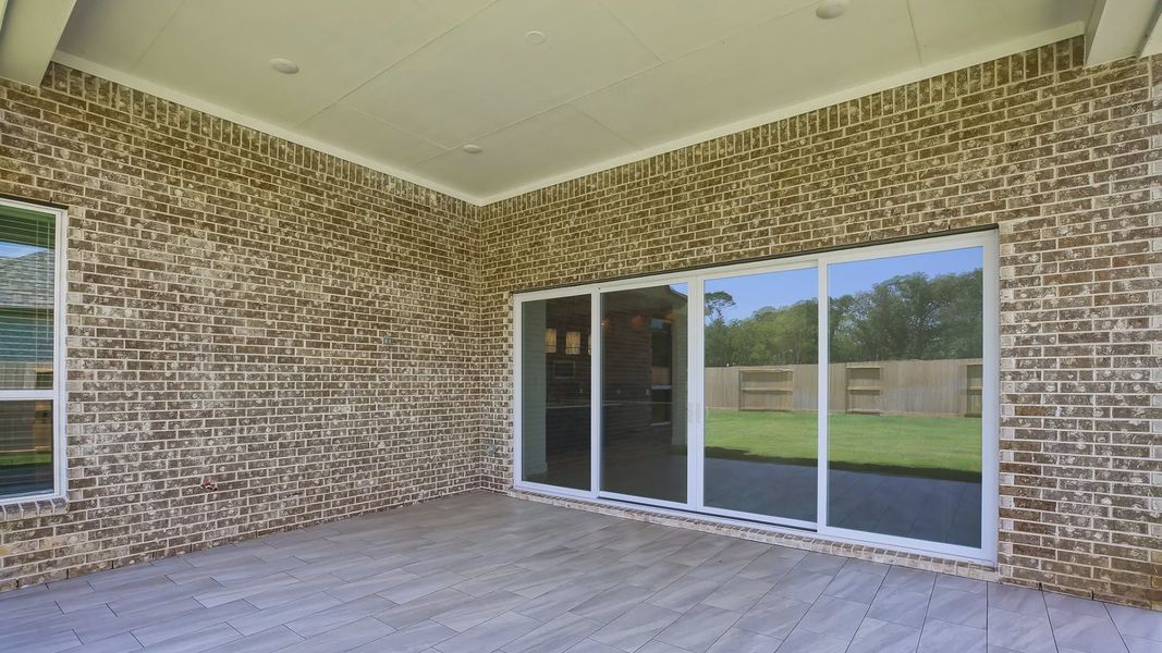 Exterior details and patio area of a home in Riceland 60',65',70', Mont Belvieu (Image 25).