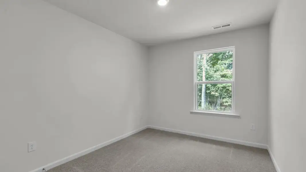 Spacious, unfurnished interior of a new home in The Townes at Prestleigh, Wake Forest (Image 19).