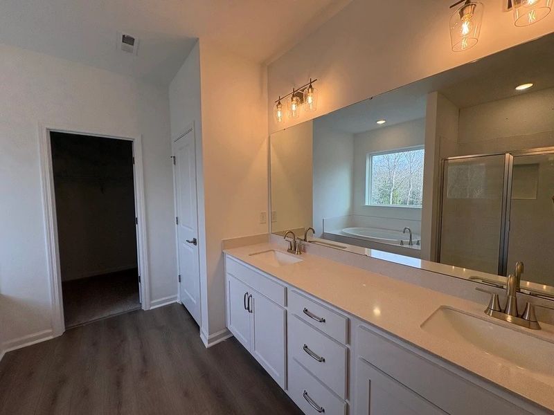 Primary Bath featuring the AW Collection® Timeless - Clean lines and graceful, polished details.