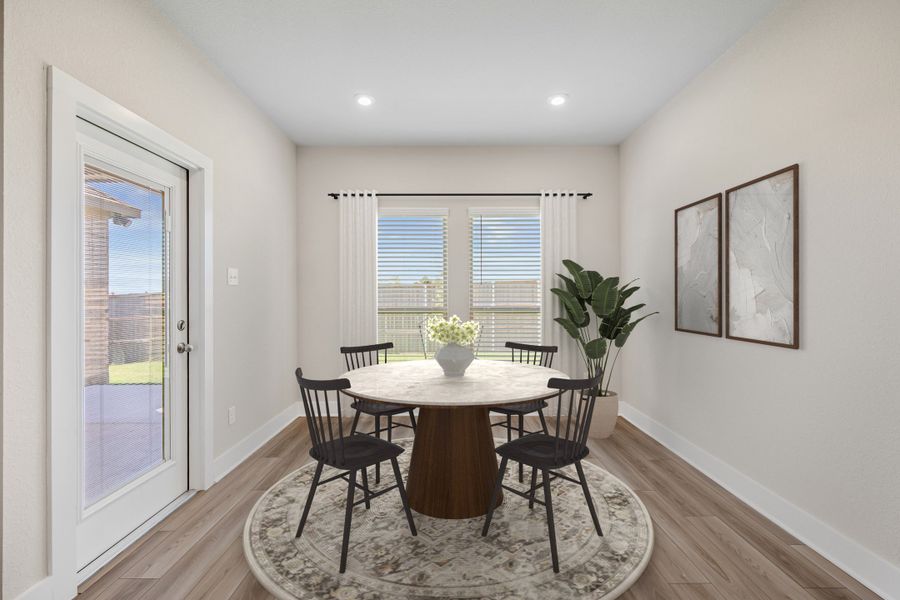 Representative furnished interior of a home built from the Newport by Omega Builders in Southern Pointe, College Station (Image 8).