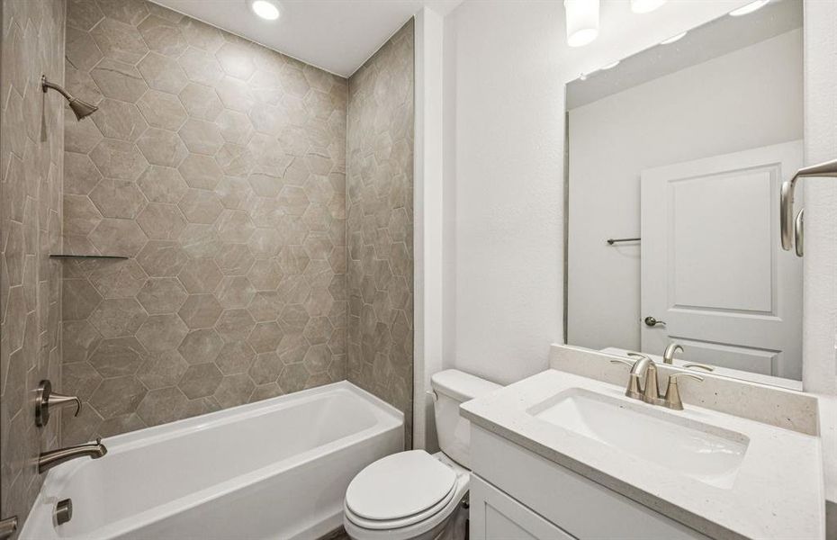 Stylish secondary bath with high-end fixtures *Real home pictured Stylish secondary bath with high-end fixtures *Real home pictured