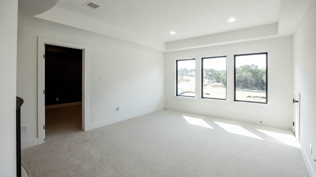 Spacious, unfurnished interior of a new home in Parkside on the River, Georgetown (Image 19).