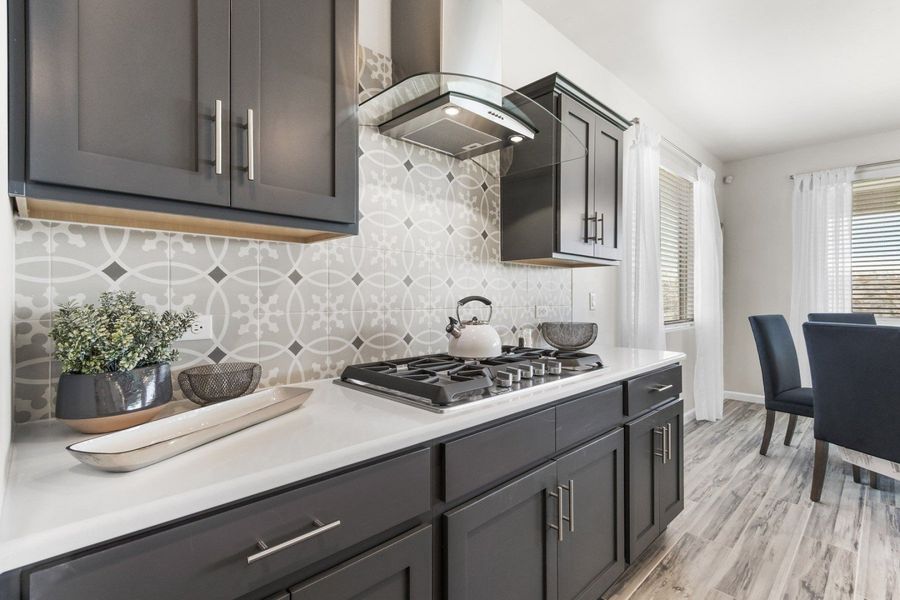 Representative furnished interior of a home built from the Valencia by Hakes Brothers in Hillside Park, El Paso (Image 20).