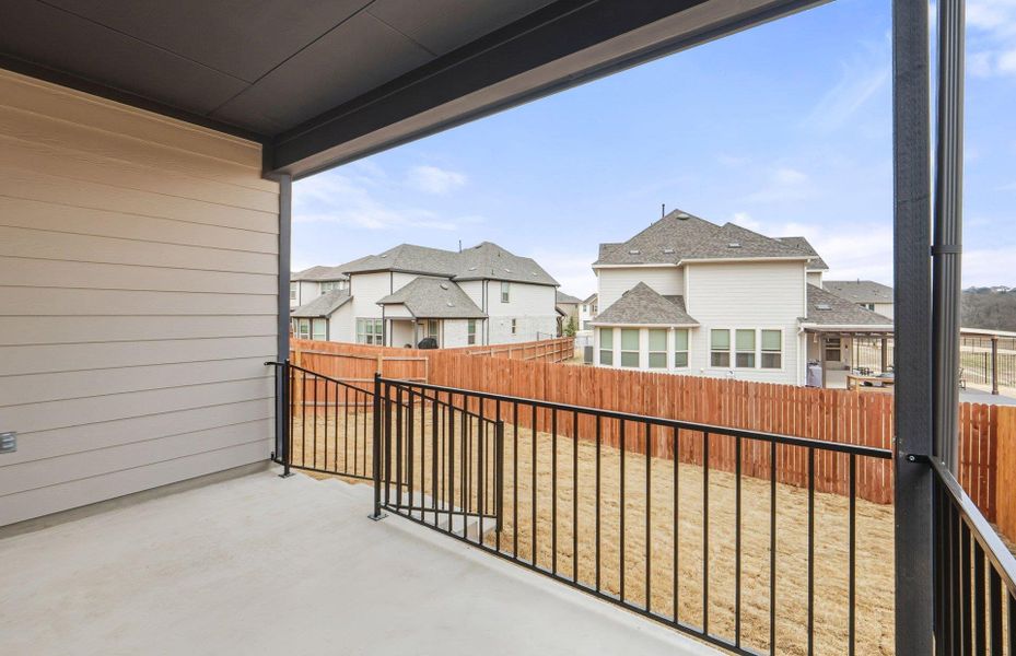 Exterior details and patio area of a home in Saddleback at Santa Rita Ranch, Liberty Hill (Image 17).
