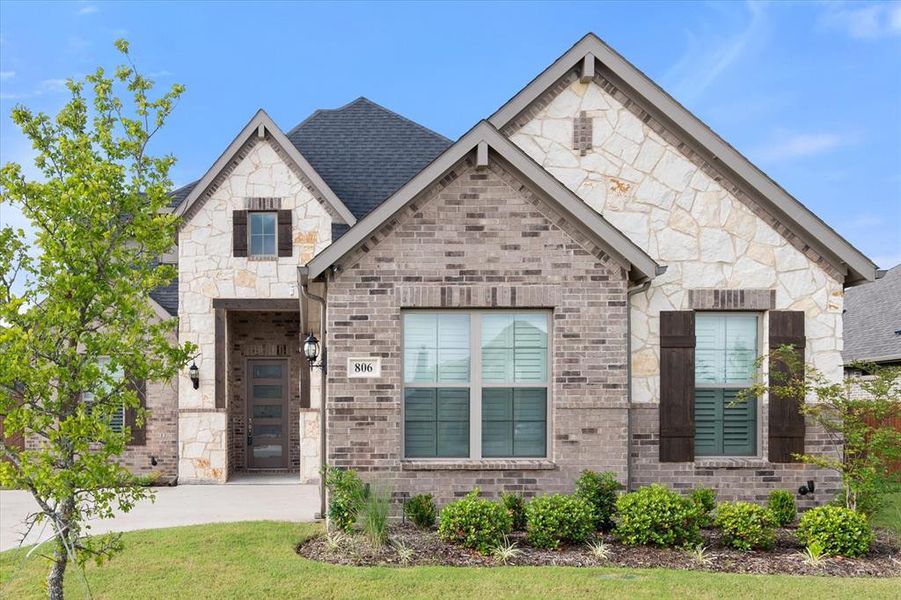 Front exterior of a new home in , Midlothian, TX, highlighting curb appeal (Image 25). Front exterior of a new home in , Midlothian, TX, highlighting curb appeal (Image 25).
