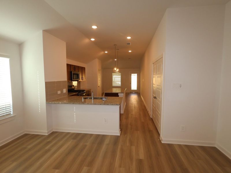 Furnished interior view inside a new home in Pinewood at Grand Texas, New Caney (Image 10).