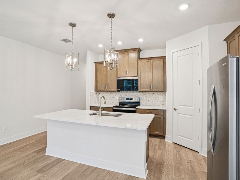 Furnished interior view inside a new home in Ridgehaven - Signature Series, Ormond Beach (Image 4).
