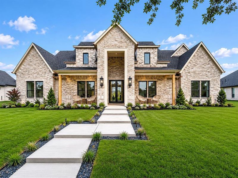 Front exterior of a new home in , Forney, TX, highlighting curb appeal (Image 2). Front exterior of a new home in , Forney, TX, highlighting curb appeal (Image 2).