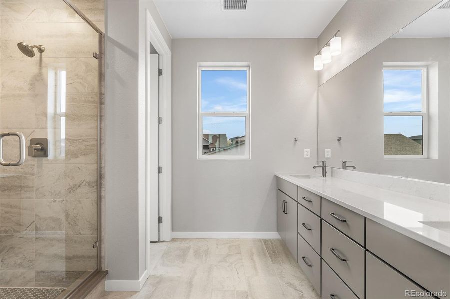 Furnished interior view inside a new home in Tribute at Lyric, Lone Tree (Image 11).