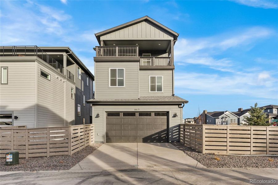 Front exterior of a new home in Sterling Ranch Apex Collection, Littleton, CO, highlighting curb appeal (Image 1).