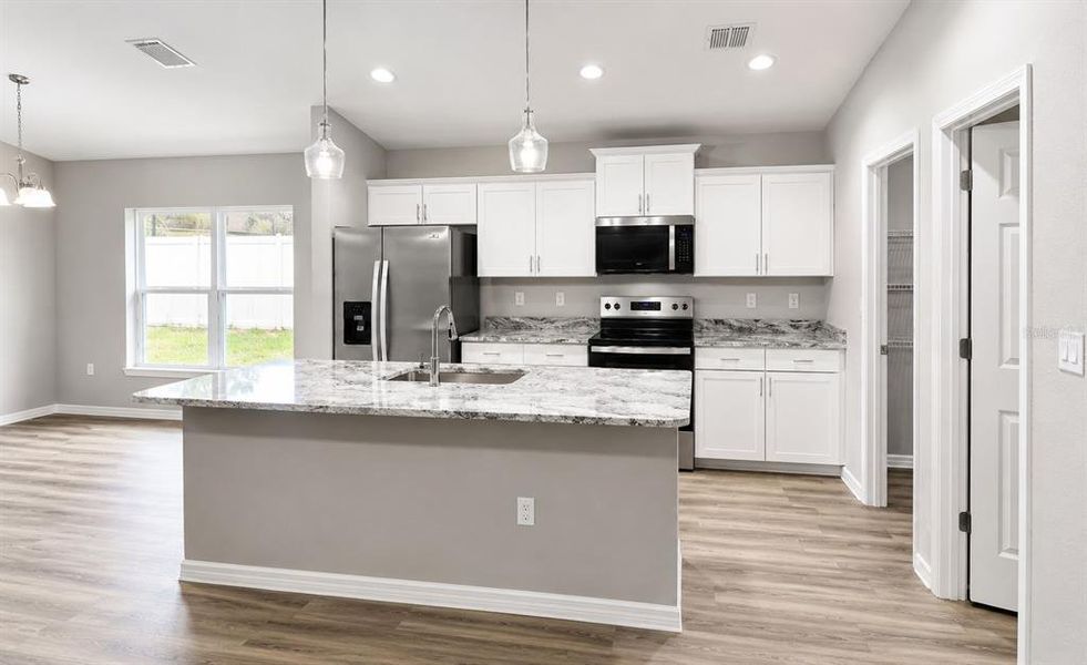 Furnished interior view inside a new home in , Summerfield (Image 4).