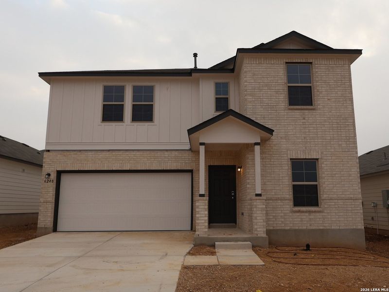 Front exterior of a new home in Mesquite Ridge, San Antonio, TX, highlighting curb appeal (Image 21).