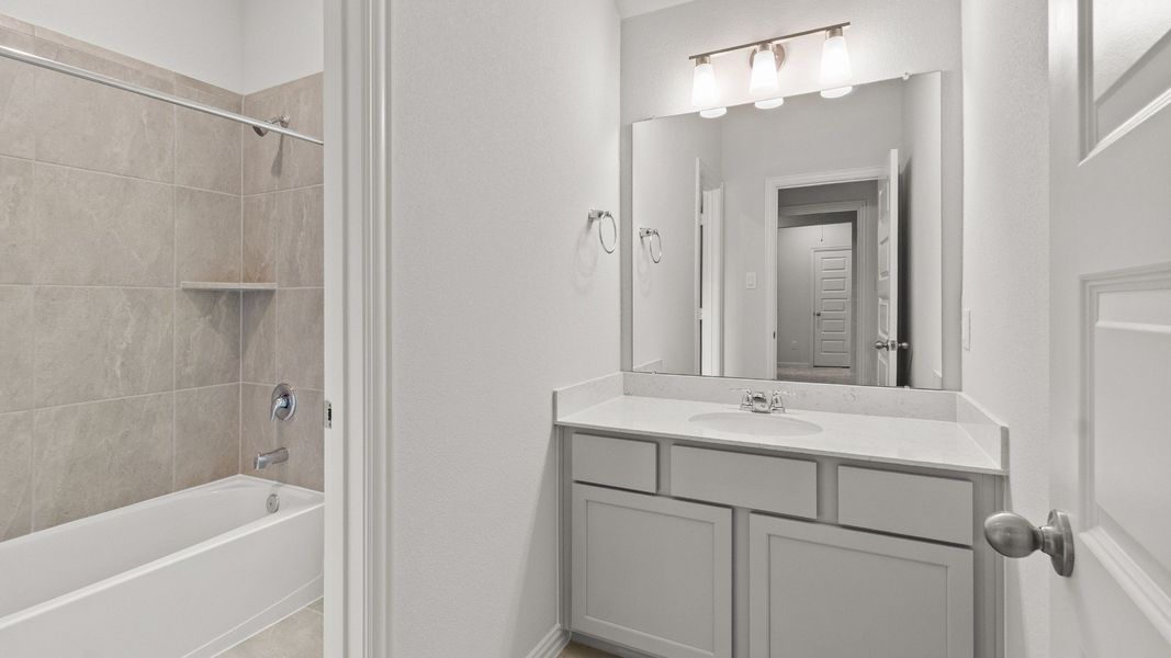 Representative furnished interior of a home built from the Capri II by Brightland Homes in Bridgeland Creekland Village, Cypress (Image 15).