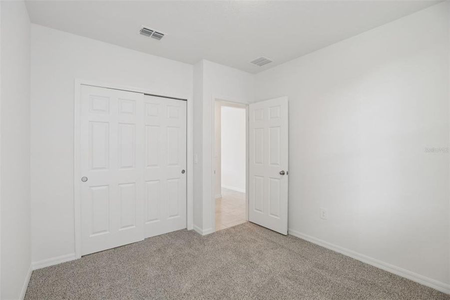 Spacious, unfurnished interior of a new home in Springs at Lake Alfred - Classic Series, Lake Alfred (Image 37).