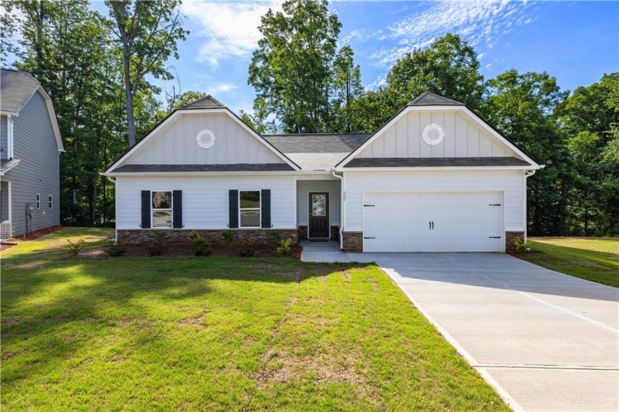 Front exterior of a new home in , Villa Rica, GA, highlighting curb appeal (Image 2).