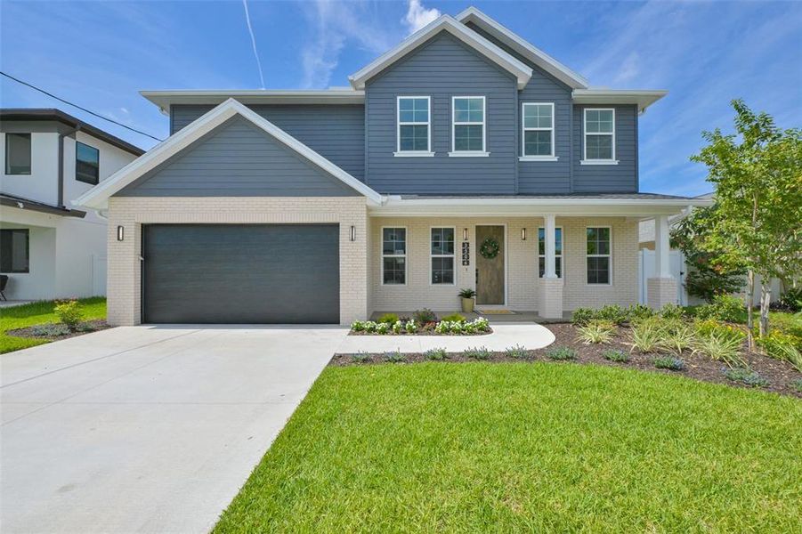 Front exterior of a new home in , Tampa, FL, highlighting curb appeal (Image 27).
