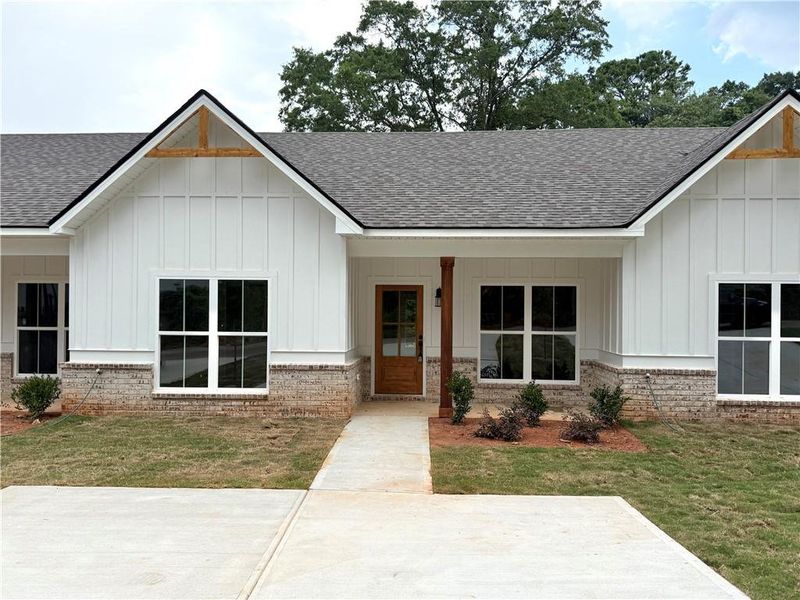 Front exterior of a new home in , Carrollton, GA, highlighting curb appeal (Image 1). Front exterior of a new home in , Carrollton, GA, highlighting curb appeal (Image 1).