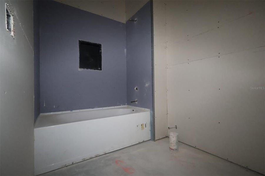 In-progress construction of a new home in Eden at Crossprairie, St. Cloud, FL (Image 22).