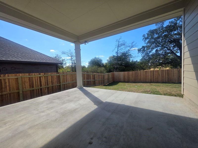 Exterior details and patio area of a home in , Brenham (Image 10).