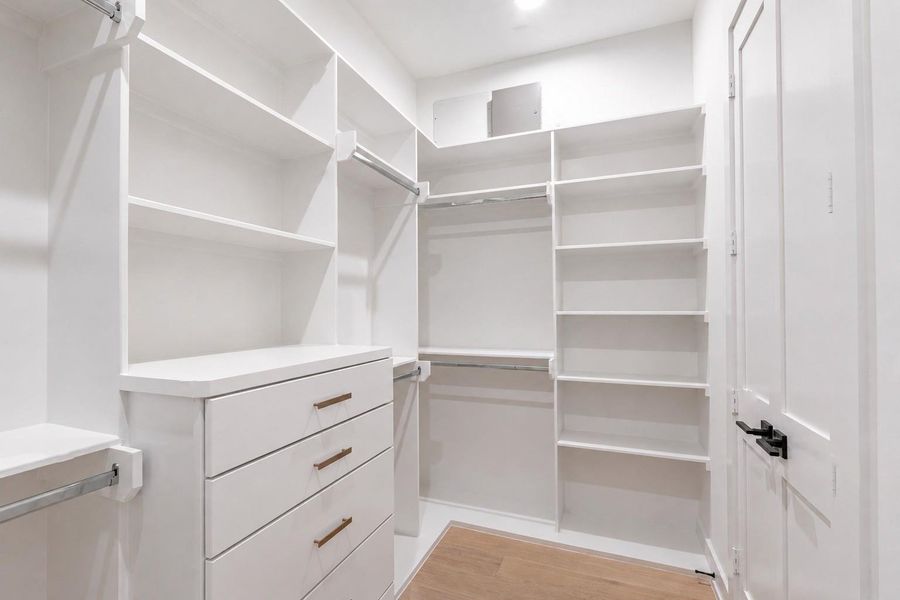 One of two closets for the primary bedroom One of two closets for the primary bedroom