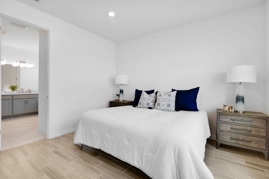 Representative furnished interior of a home built from the Saint Thomas by Taylor Morrison in Ardisia Park, New Smyrna Beach (Image 33).