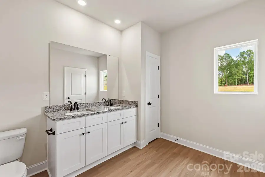 Furnished interior view inside a new home in Ascot Woods, Charlotte (Image 7). Furnished interior view inside a new home in Ascot Woods, Charlotte (Image 7).