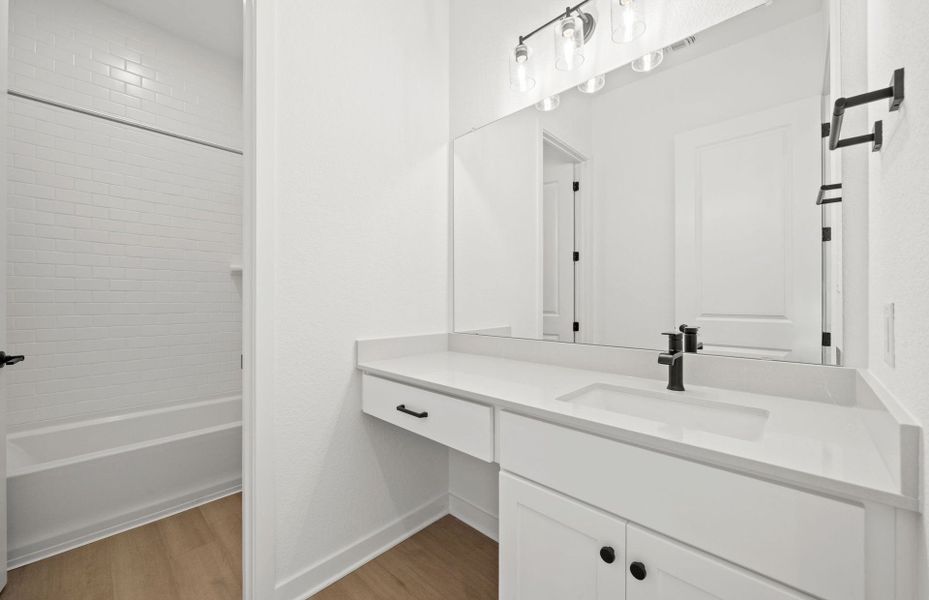 Furnished interior view inside a new home in 6 Creeks, Kyle (Image 7).