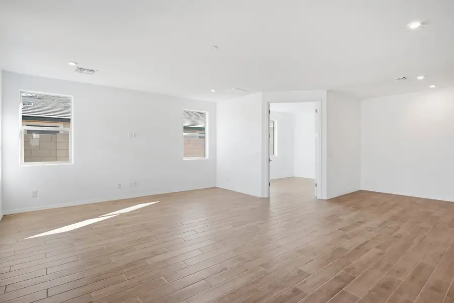 Spacious, unfurnished interior of a new home in Marbella at Windrose, Waddell (Image 23). Spacious, unfurnished interior of a new home in Marbella at Windrose, Waddell (Image 23).