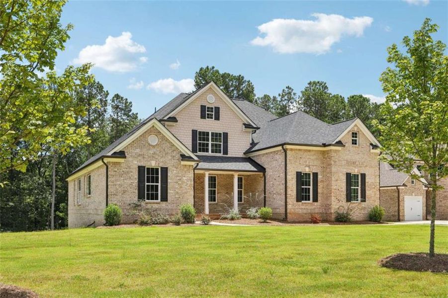 Front exterior of a new home in Whitestone, Douglasville, GA, highlighting curb appeal (Image 16).