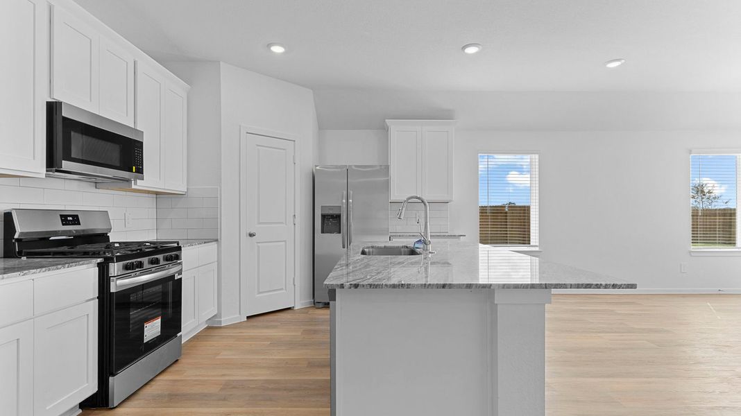 Furnished interior view inside a new home in Watermark, Alvin (Image 4).