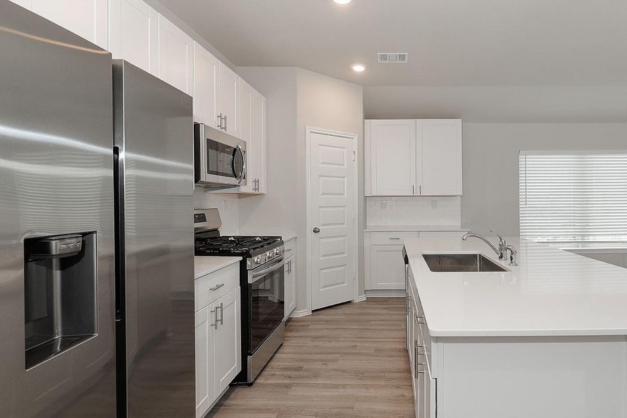 Furnished interior view inside a new home in , Magnolia (Image 6).