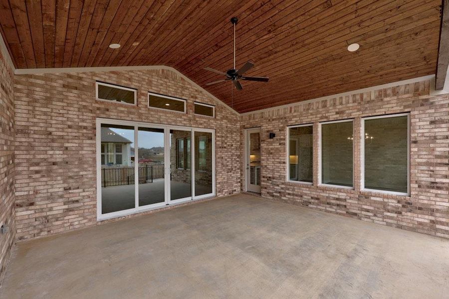Front exterior of a new home in Santa Rita Ranch, Liberty Hill, TX, highlighting curb appeal (Image 17).