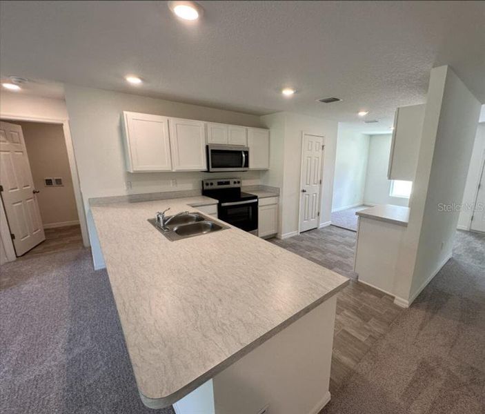 Furnished interior view inside a new home in Palm Coast, Palm Coast (Image 5). Furnished interior view inside a new home in Palm Coast, Palm Coast (Image 5).
