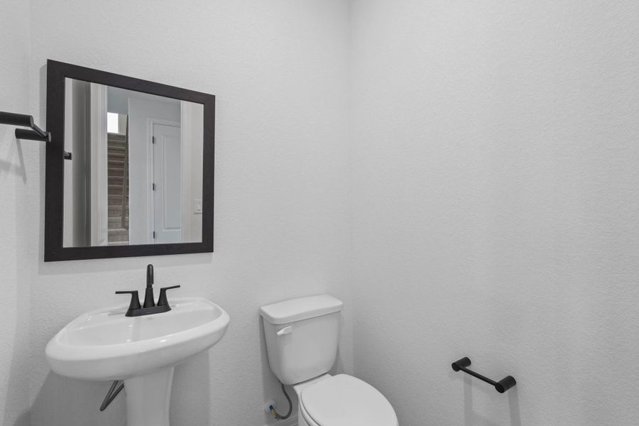 Half bathroom. Sample product photo. Actual exterior and interior selections may vary by homesite. Photo may be virtually staged. Half bathroom. Sample product photo. Actual exterior and interior selections may vary by homesite. Photo may be virtually staged.
