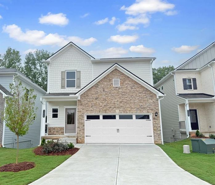 Front exterior of a new home in Sanders Park, Austell, GA, highlighting curb appeal (Image 2).