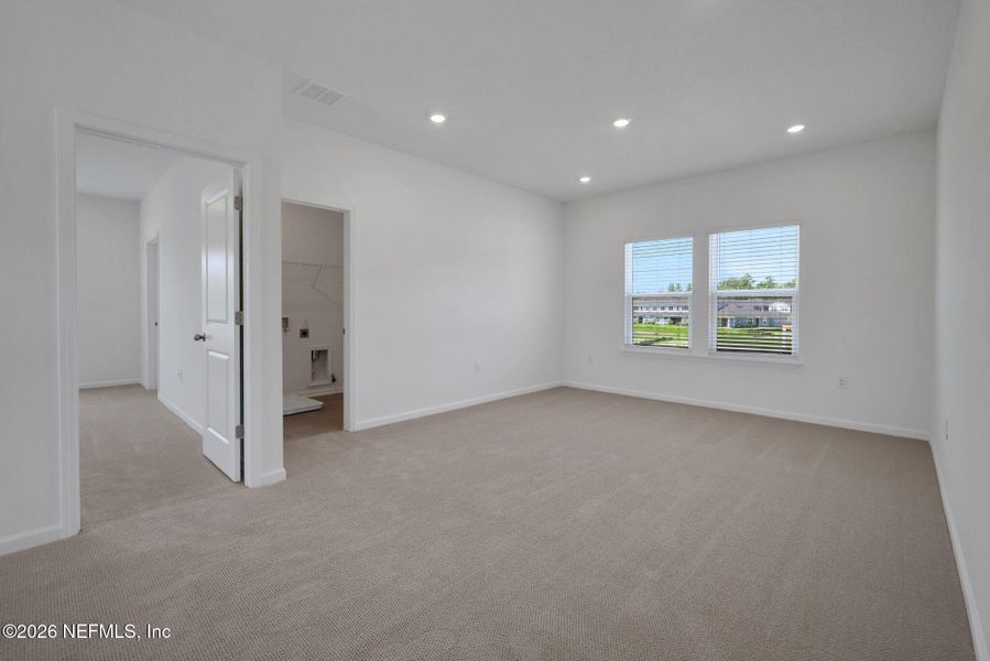 Spacious, unfurnished interior of a new home in Brook Forest, St. Augustine (Image 40).
