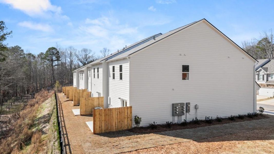 Exterior details and patio area of a home in Falcon Landing, Gainesville (Image 16).