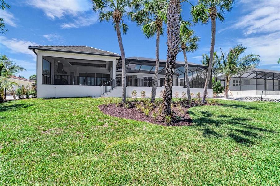 Exterior details and patio area of a home in , Sarasota (Image 27).