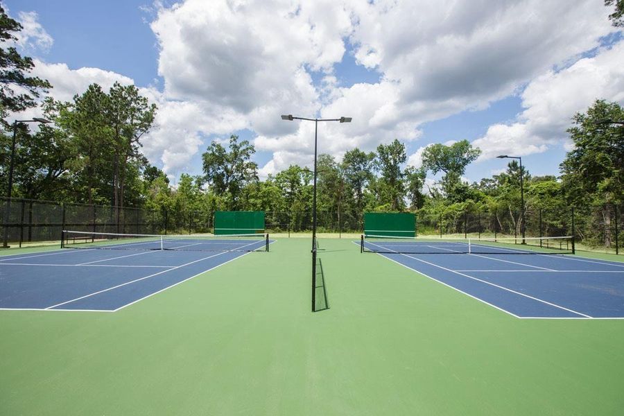 Neighborhood tennis courts which also serve as pickleball courts with permanent lines