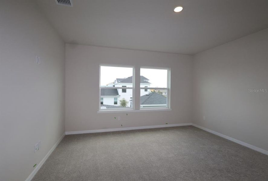Spacious, unfurnished interior of a new home in Laureate Park at Lake Nona - Garden Series, Orlando (Image 23).